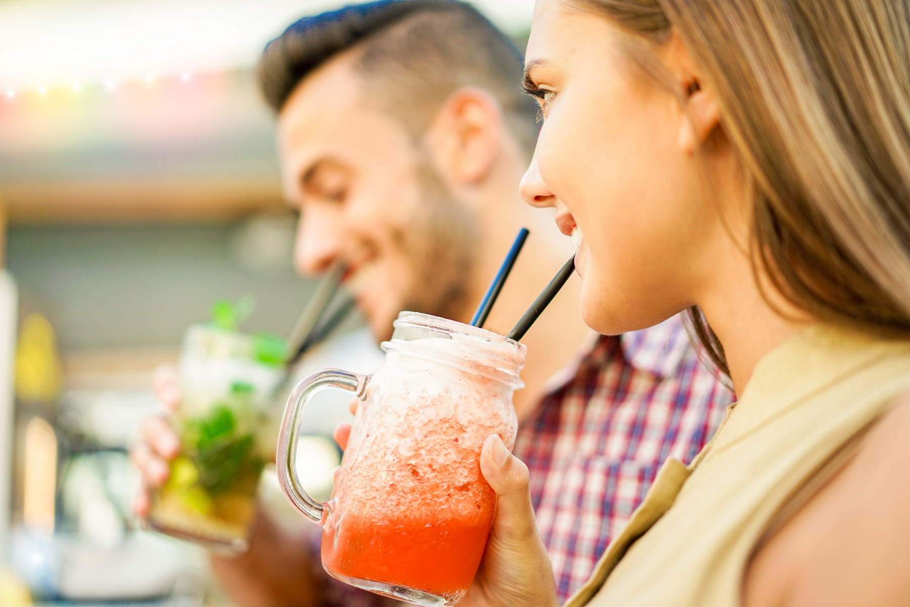 Couple enjoying beverages outdoors