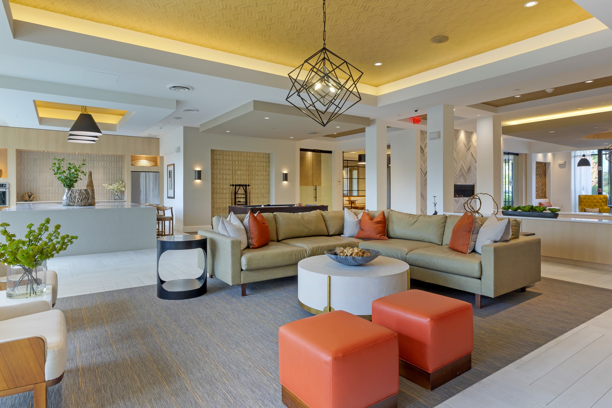 Clubhouse with variety of seating, pool table, designer lighting, large flat screen TV, and tile flooring